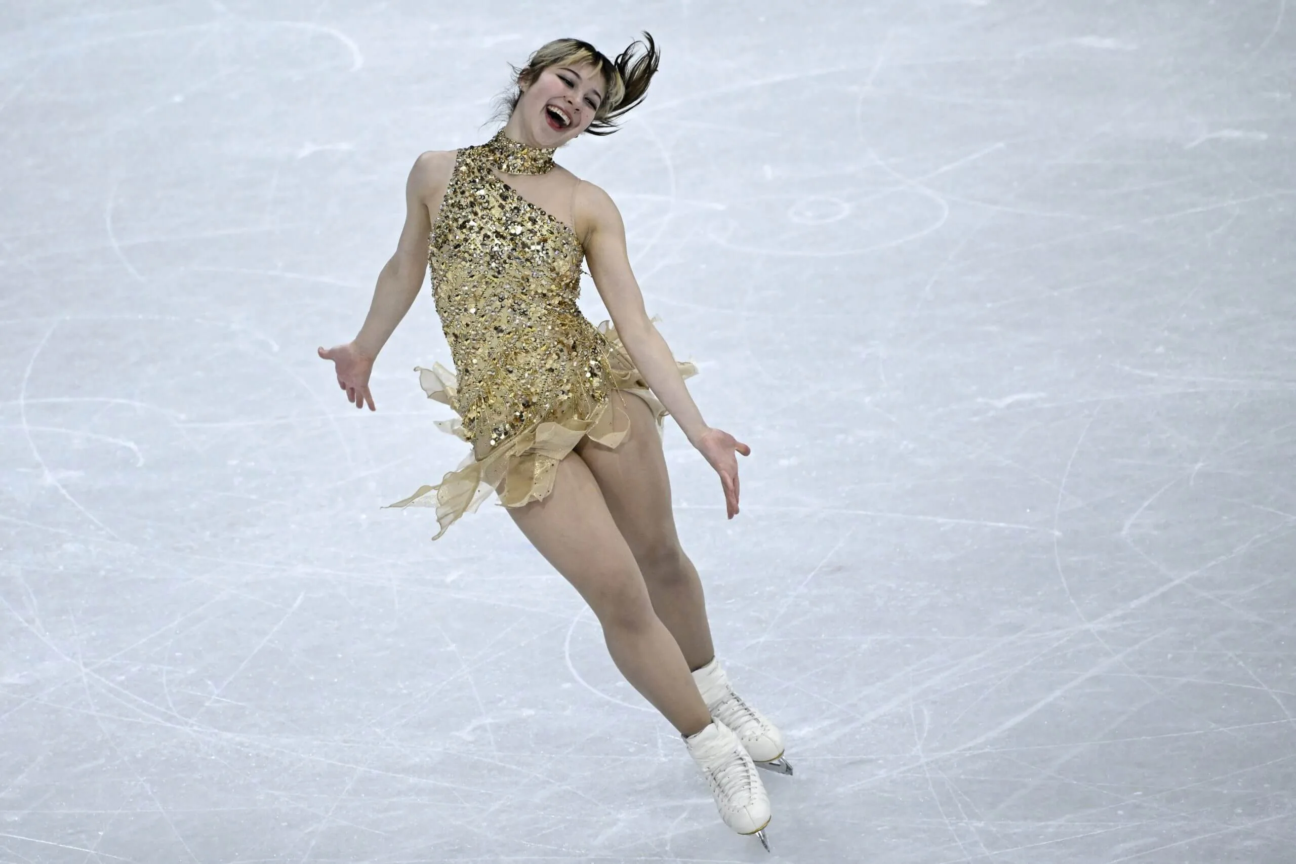Alysa Liu mid-routine, skating with visible joy